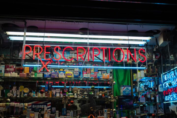 prescriptions sign on a drug store front