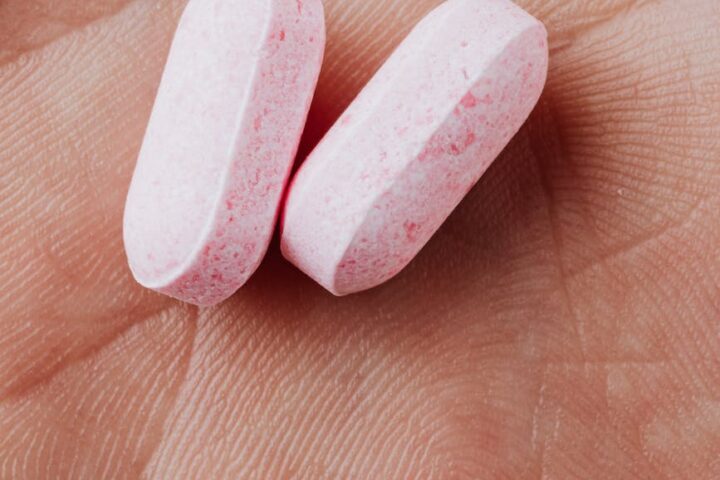 close up view of two medicinal tablets